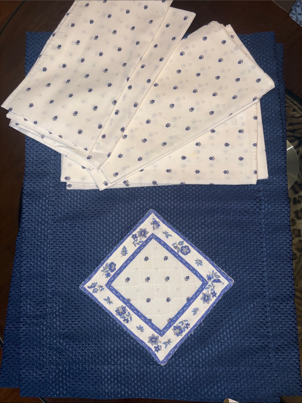 Blue Textured Placemats with White Printed Napkins and quilted coaster